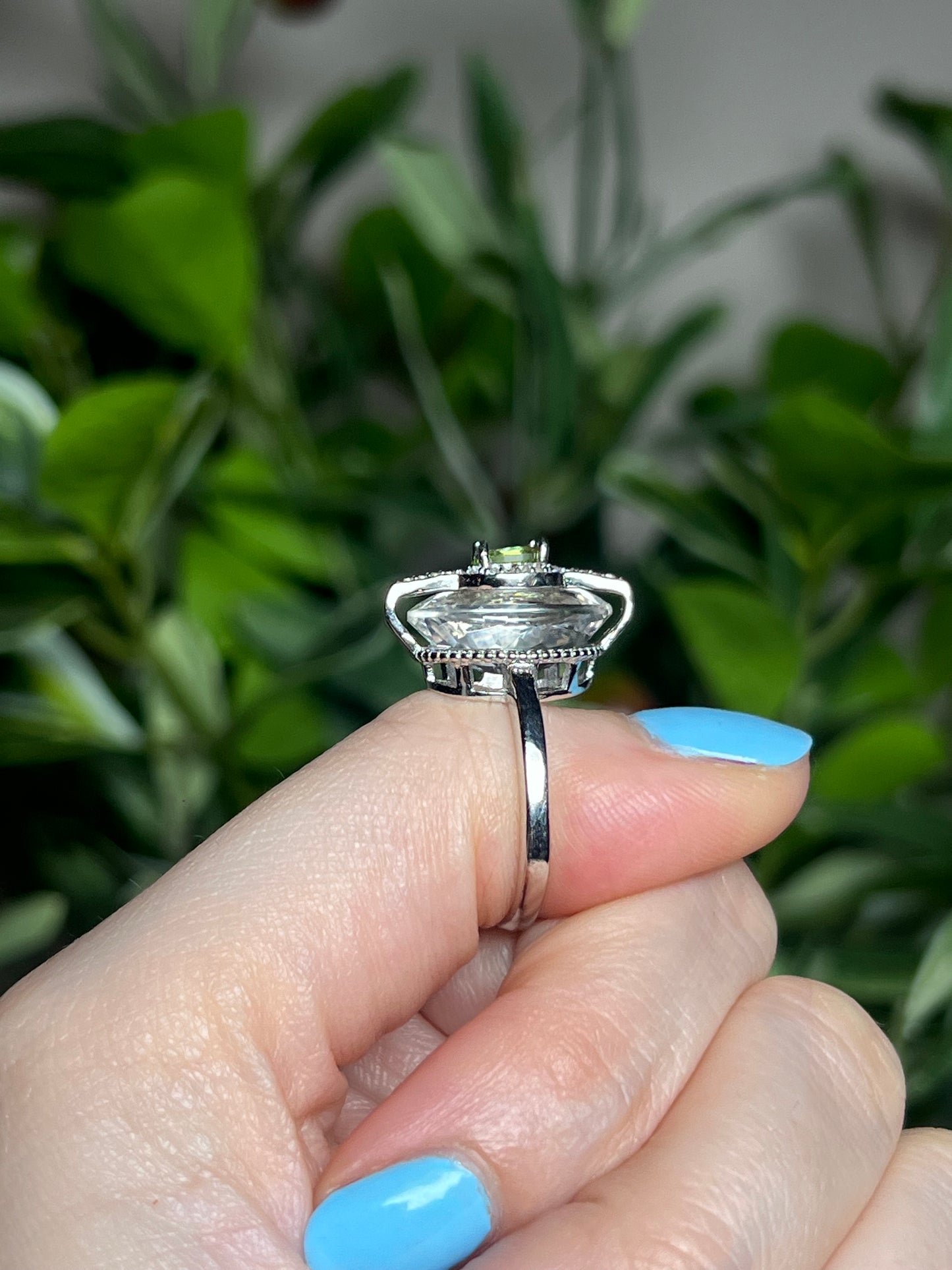 Clear quartz with Peridot, Garnet or Tanzanite rings