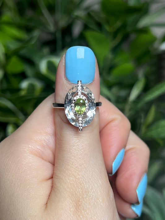 Clear quartz with Peridot, Garnet or Tanzanite rings
